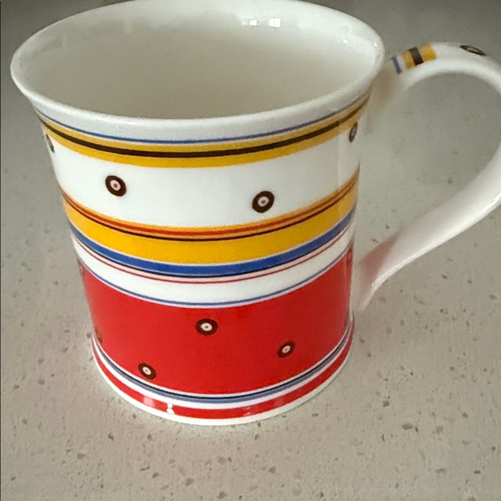 Colorful Striped Mug with Red and Yellow Accents